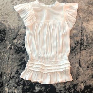 White blouse with peplum and buttons on back